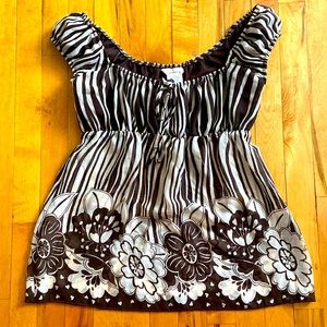 Speechless blouse. Zebra stripes with flowers. Size medium